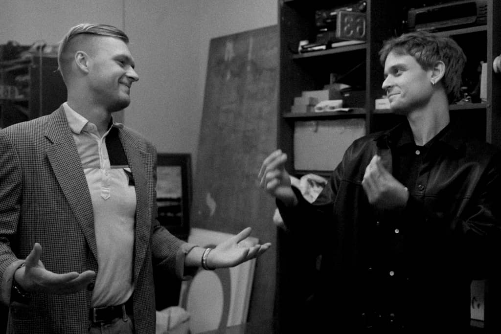 Two dudes about to make sweet love in the backstage