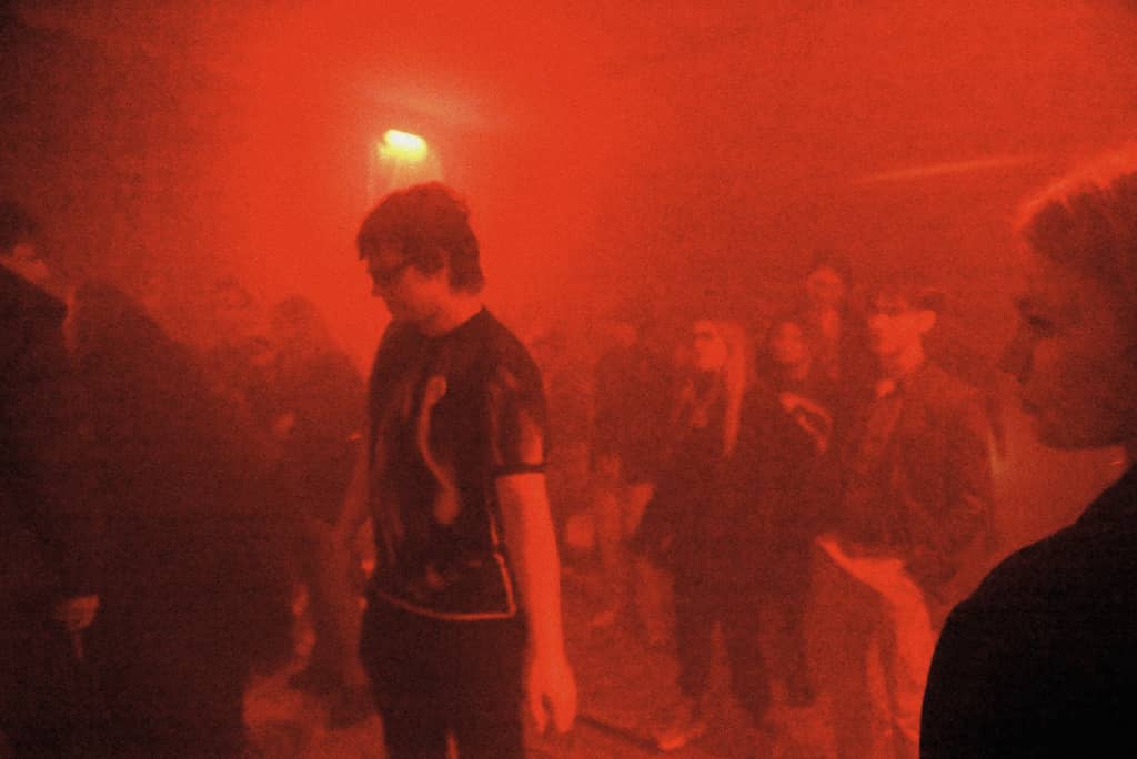 People dancing in RED lighting