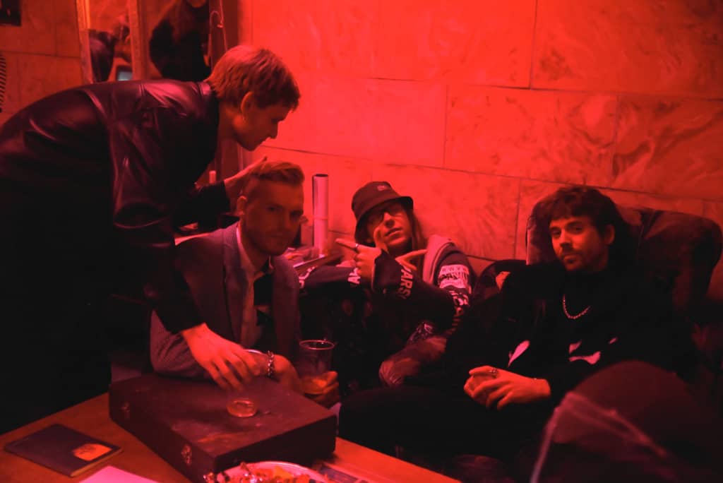 A bunch of people gathered at the entrance