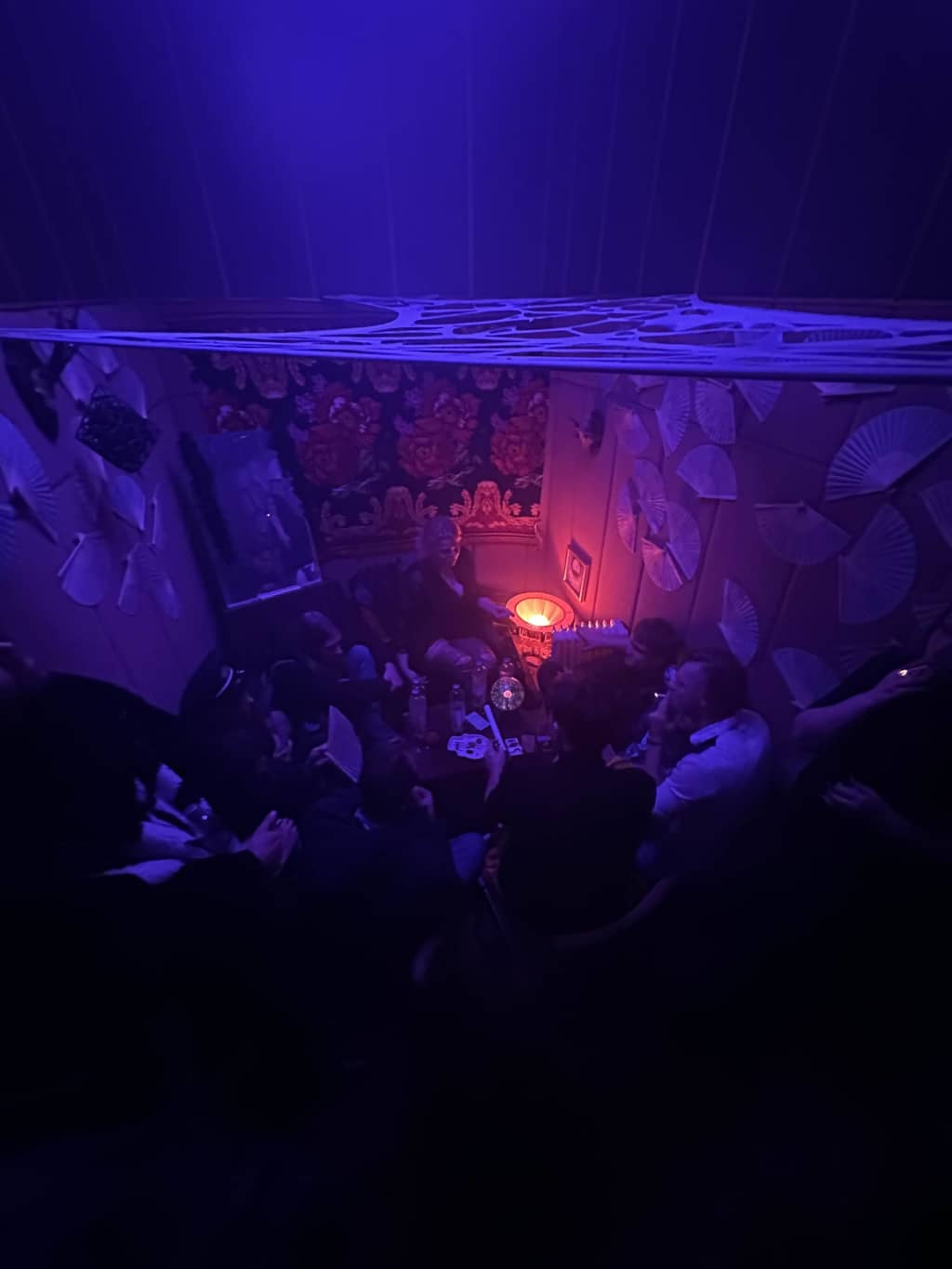 A bunch of people gathered at the fortune-teller