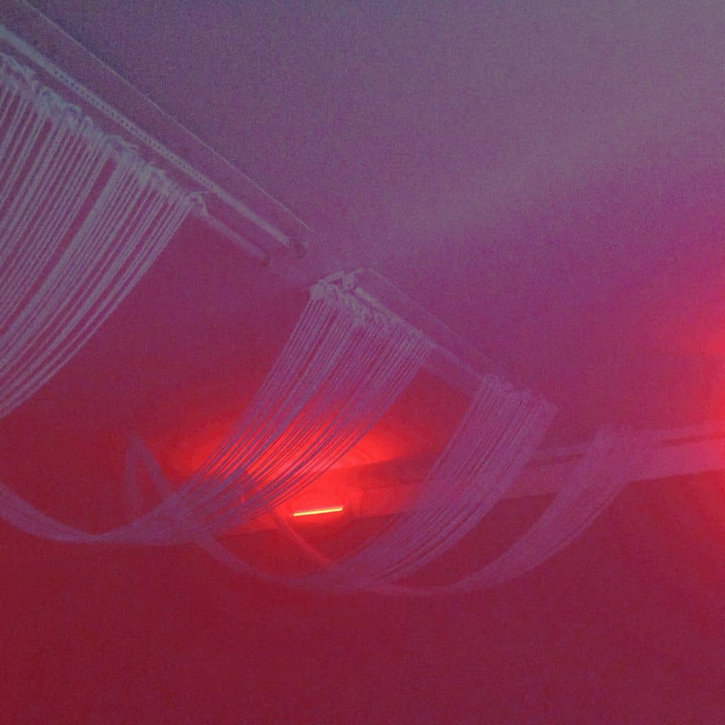 Cool looking ceiling with a red light